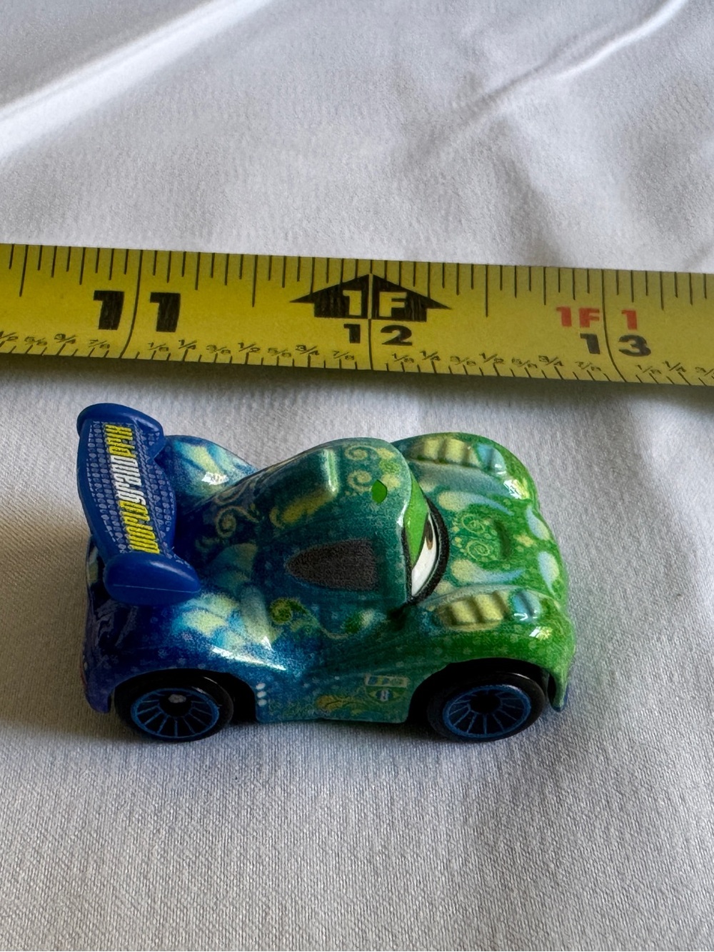 Die-cast metal toy car 'Carla Veloso' from Disney Pixar Cars Mini Racers series